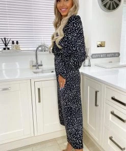 AX Paris Black Dotty Long Sleeve Wrap Over Belted Jumpsuit