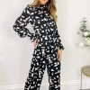 AX Paris Black Printed Long Sleeve Elasticated Neck Jumpsuit