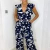 AX Paris Navy And White Floral Wrap Front Belted Jumpsuit Jumpsuits And Playsuits