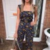 AX Paris Navy Mixed Floral Frill Sleeve Jumpsuit Jumpsuits And Playsuits